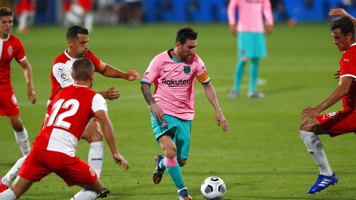 Lionel Messi Barcelonas Lionel Messi, centre, in action during the pre-season friendly soccer match between Barcelona and Girona at the Johan Cruyff Stadium in Barcelona, Spain, Wednesday, Sept. 16, 2020. (AP Photo/Joan Monfort)