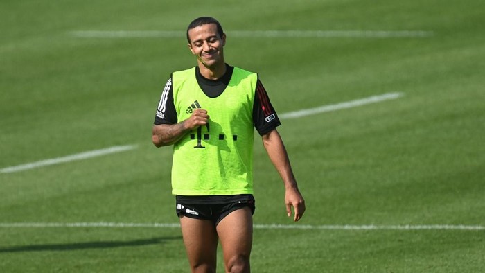 Bayern Munichs Spanish midfielder Thiago Alcantara smiles during the first season training session of the German first division Bundesliga team FC Bayern Munich at the team trainings ground in Munich, southern Germany, on September 11, 2020. (Photo by Christof STACHE / AFP)