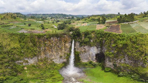 Aerial view Sipiso-piso waterfall in Sumatra, travel destination in Berastagi and Lake Toba, Indonesia.