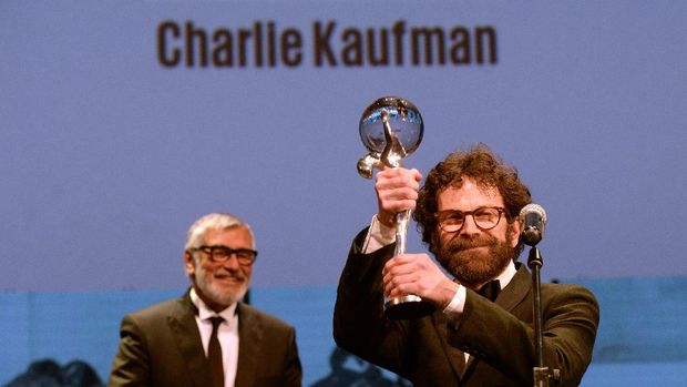 US screenwriter and film director Charlie Kaufman poses for photographers after being awarded with the Crystal Globe Award for Outstanding Artistic Contribution to World Cinema during the closing ceremony of the 51th Karlovy Vary International Film Festival (KVIFF) in Karlovy Vary on July 09, 2016. (Photo by Michal Cizek / AFP)