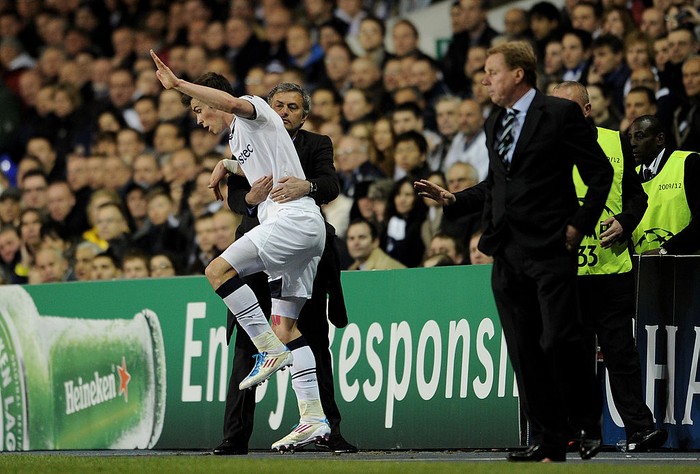 LONDON, ENGLAND - APRIL 13: Real Madrid manager Jose Mourinho grabs Gareth Bale of Spurs as he falls during the UEFA Champions League quarter final second leg match between Tottenham Hotspur and Real Madrid at White Hart Lane on April 13, 2011 in London, England.  (Photo by Jasper Juinen/Getty Images)