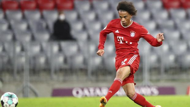 Bayern's Leroy Mane shoots to score his team's seventh goal, during the German Bundesliga soccer match between FC Bayern Munich and Schalke 04 in Munich, Germany, Friday, Sept. 18, 2020. (AP Photo/Matthias Schrader)
