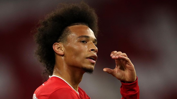 Leroy Sane Bayern Munich MUNICH, GERMANY - SEPTEMBER 18: Leroy Sane of Bayern Munich celebrates after he scores his teams seventh goal during the Bundesliga match between FC Bayern Muenchen and FC Schalke 04 at Allianz Arena on September 18, 2020 in Munich, Germany. Fans are set to return to Bundesliga stadiums in Germany despite to the ongoing Coronavirus Pandemic. Up to 20% of stadium's capacity are allowed to be filled. Final decisions are left to local health authorities and are subject to club's hygiene concepts and the infection numbers in the corresponding region. The match in Munich is played behind closed doors due to the high number of new Covid-19 cases in the city of Munich. (Photo by Alexander Hassenstein/Getty Images)