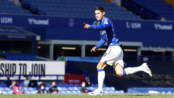 Evertons James Rodriguez celebrates after scoring his sides second goal during the English Premier League soccer match between Everton and West Bromwich Albion at Goodison Park in Liverpool, England Saturday, Sept. 19, 2020. (Nick Potts/Pool via AP)