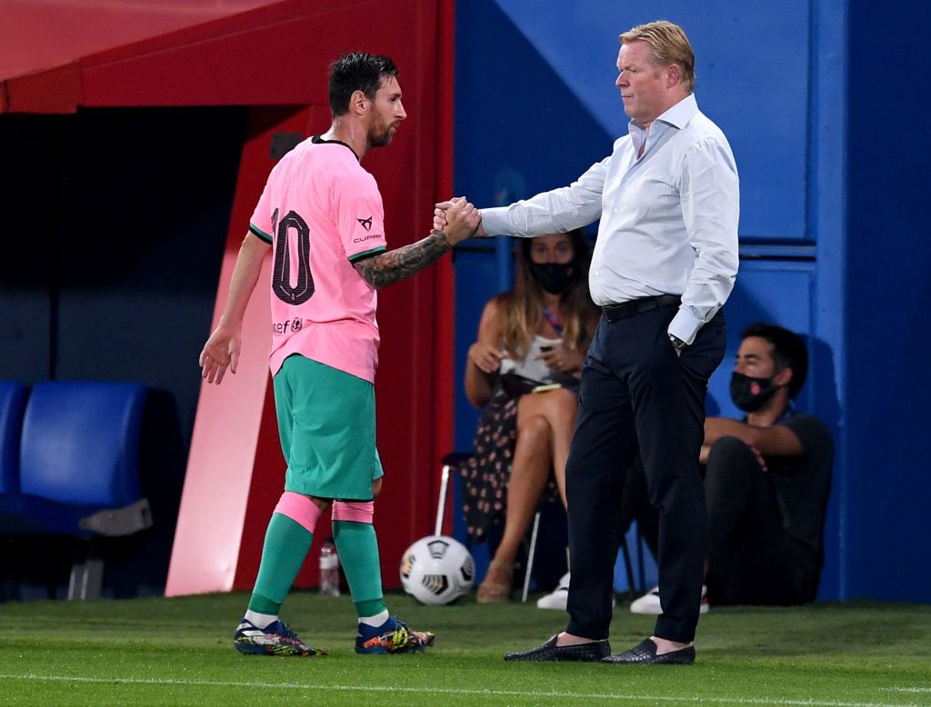 BARCELONA, SPAIN - SEPTEMBER 16: Ronald Koeman, Head Coach of FC Barcelona greets Lionel Messi of FC Barcelona as Lionel Messi is substituted off during the pre-season friendly match between FC Barcelona and Girona at Estadi Johan Cruyff on September 16, 2020 in Barcelona, Spain. (Photo by David Ramos/Getty Images)