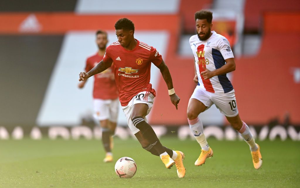 MANCHESTER, ENGLAND - SEPTEMBER 19: Anthony Martial of Manchester United takes on James McArthur of Crystal Palace during the Premier League match between Manchester United and Crystal Palace at Old Trafford on September 19, 2020 in Manchester, England. (Photo by Martin Rickett - Pool/Getty Images)
