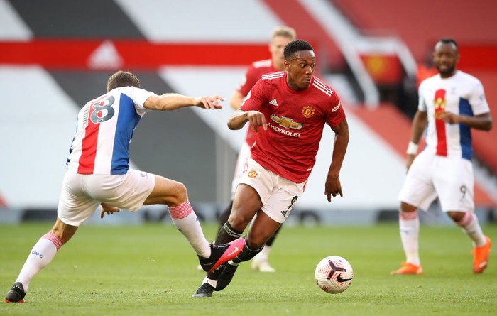 MANCHESTER, ENGLAND - SEPTEMBER 19: Anthony Martial of Manchester United takes on James McArthur of Crystal Palace during the Premier League match between Manchester United and Crystal Palace at Old Trafford on September 19, 2020 in Manchester, England. (Photo by Martin Rickett - Pool/Getty Images)