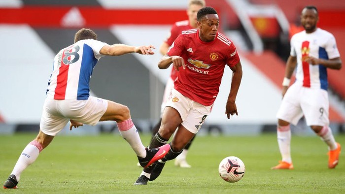 MANCHESTER, ENGLAND - SEPTEMBER 19: Anthony Martial of Manchester United takes on James McArthur of Crystal Palace during the Premier League match between Manchester United and Crystal Palace at Old Trafford on September 19, 2020 in Manchester, England. (Photo by Martin Rickett - Pool/Getty Images)