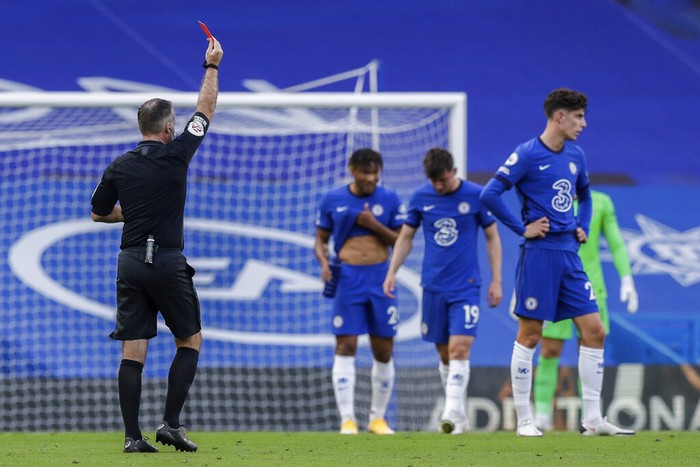 Andreas Christensen Referee Paul Tierney shows a red card to Chelsea's Andreas Christensen, not pictured, during the English Premier League soccer match between Chelsea and Liverpool at Stamford Bridge Stadium, Sunday, Sept. 20, 2020. (AP Photo/Matt Dunham, Pool)