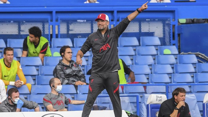 Liverpools manager Jurgen Klopp gestures during the English Premier League soccer match between Chelsea and Liverpool at Stamford Bridge Stadium, Sunday, Sept. 20, 2020. (Will Oliver/Pool via AP)