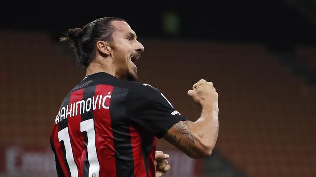 AC Milan's Zlatan Ibrahimovic celebrates his goal against Bologna during the Serie A soccer match between AC Milan and Bologna at the San Siro stadium, in Milan, Italy, Monday, Sept. 21, 2020. (AP Photo/Antonio Calanni)