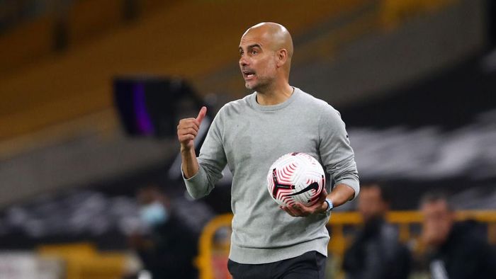Pep Guardiola WOLVERHAMPTON, ENGLAND - SEPTEMBER 21: Pep Guardiola, Manager of Manchester City reacts during the Premier League match between Wolverhampton Wanderers and Manchester City at Molineux on September 21, 2020 in Wolverhampton, England. (Photo by Marc Atkins/Getty Images)