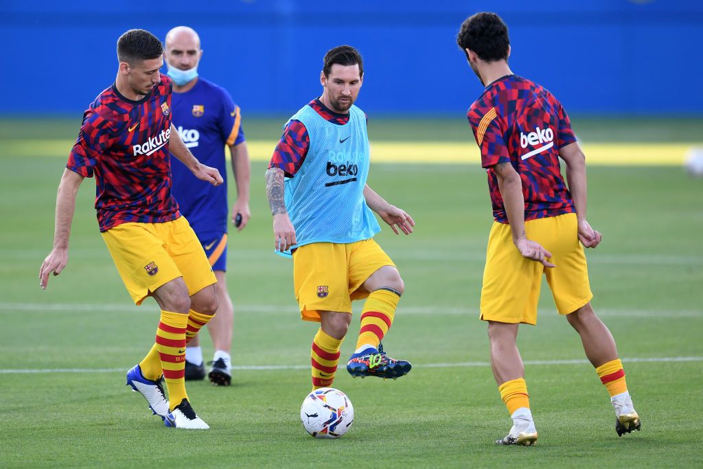 BARCELONA, SPAIN - SEPTEMBER 16: Lionel Messi of Barcelona celebrates with teammate Philippe Coutinho after scoring his sides third goal during the pre-season friendly match between FC Barcelona and Girona at Estadi Johan Cruyff on September 16, 2020 in Barcelona, Spain. (Photo by David Ramos/Getty Images)
