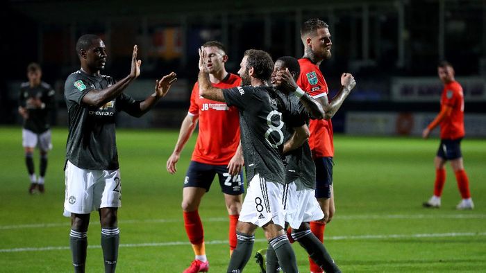 Manchester United LUTON, ENGLAND - SEPTEMBER 22: Juan Mata of Manchester United celebrates after scoring his sides first goal during the Carabao Cup Third Round match between Luton Town and Manchester United at Kenilworth Road on September 22, 2020 in Luton, England. Sporting Stadiums around Europe remain empty due to the Coronavirus Pandemic as Government social distancing laws prohibit fans inside venues resulting in games being played behind closed doors (Photo by Catherine Ivill/Getty Images)