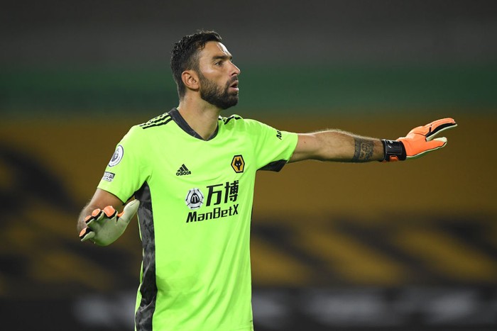 SHEFFIELD, ENGLAND - SEPTEMBER 14: Raul Jimenez of Wolverhampton Wanderers celebrates with teammates after scoring his sides first goal during the Premier League match between Sheffield United and Wolverhampton Wanderers at Bramall Lane on September 14, 2020 in Sheffield, England. (Photo by Peter Powell/Pool via Getty Images)