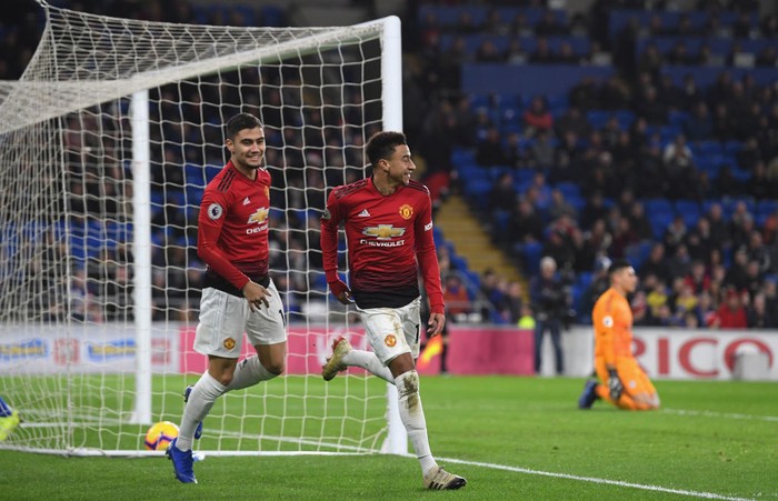 CARDIFF, WALES - DECEMBER 22:  Manchester United striker Jesse Lingard celebrates the 5th United goal with Andreas Pereira (l) during the Premier League match between Cardiff City and Manchester United at Cardiff City Stadium on December 22, 2018 in Cardiff, United Kingdom.  (Photo by Stu Forster/Getty Images)