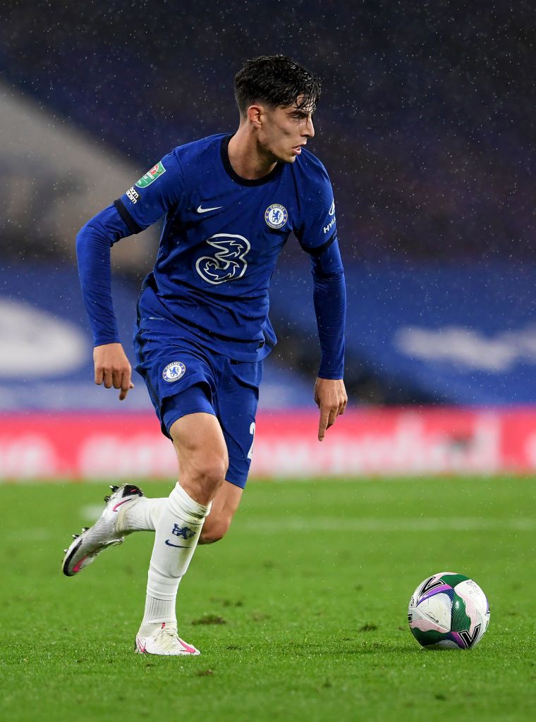 LONDON, ENGLAND - SEPTEMBER 23: Kai Havertz of Chelsea runs with the ball during the Carabao Cup third round match between Chelsea and Barnsley at Stamford Bridge on September 23, 2020 in London, England. Football Stadiums around United Kingdom remain empty due to the Coronavirus Pandemic as Government social distancing laws prohibit fans inside venues resulting in fixtures being played behind closed doors. (Photo by Neil Hall - Pool/Getty Images)