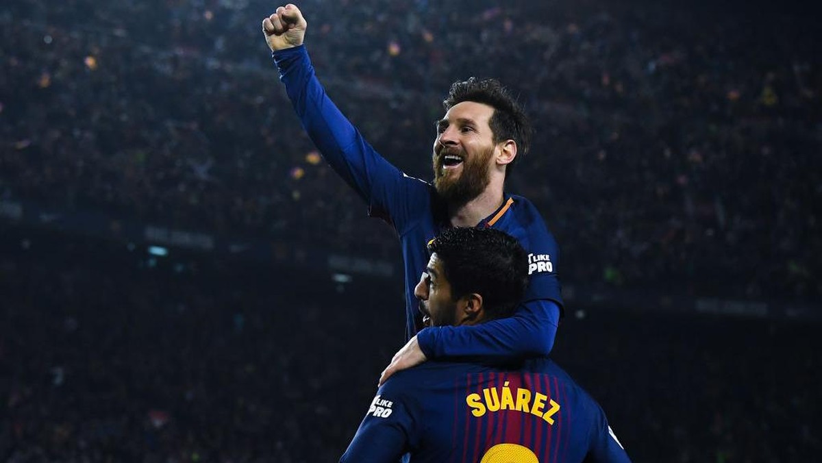 Lionel Messi dan Luis Suarez. (Foto: Getty Images)