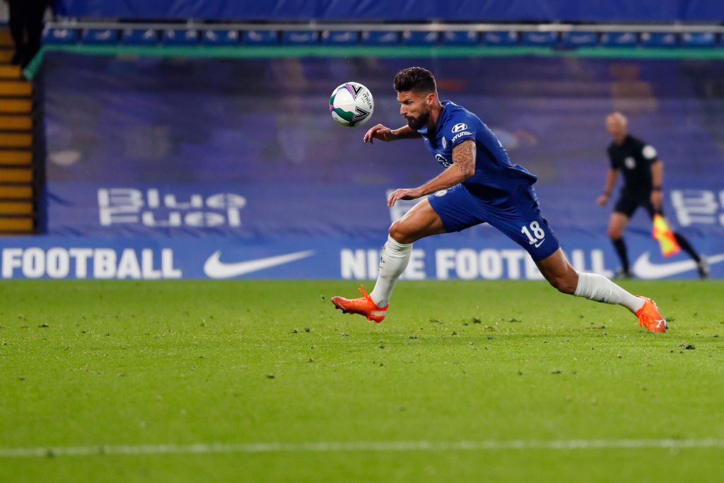 LONDON, ENGLAND - SEPTEMBER 23: Olivier Giroud of Chelsea scores his sides sixth goal during the Carabao Cup third round match between Chelsea and Barnsley at Stamford Bridge on September 23, 2020 in London, England. Football Stadiums around United Kingdom remain empty due to the Coronavirus Pandemic as Government social distancing laws prohibit fans inside venues resulting in fixtures being played behind closed doors. (Photo by Alastair Grant - Pool/Getty Images)