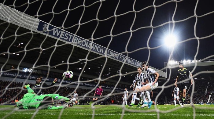 WEST BROMWICH, ENGLAND - MAY 12:  Michy Batshuayi of Chelsea scores his sides first goal past Ben Foster of West Bromwich Albion during the Premier League match between West Bromwich Albion and Chelsea at The Hawthorns on May 12, 2017 in West Bromwich, England.  (Photo by Laurence Griffiths/Getty Images)