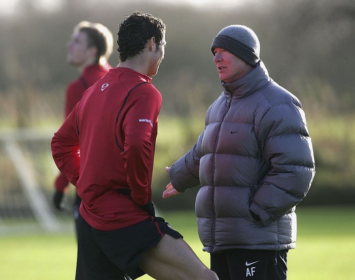 MANCHESTER, UNITED KINGDOM - DECEMBER 05:  Sir Alex Ferguson the manager of Manchester United talks with Cristiano Ronaldo during the Manchester United training session at the Carrington Training Complex on December 5, 2006 at Carrington in Manchester, England.  (Photo by Alex Livesey/Getty Images)