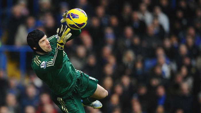 Petr Cech LONDON, ENGLAND - FEBRUARY 09: Petr Cech of Chelsea dives to make a save during the Barclays Premier League match between Chelsea and Wigan Athletic at Stamford Bridge on February 9, 2013 in London, England. (Photo by Laurence Griffiths/Getty Images)