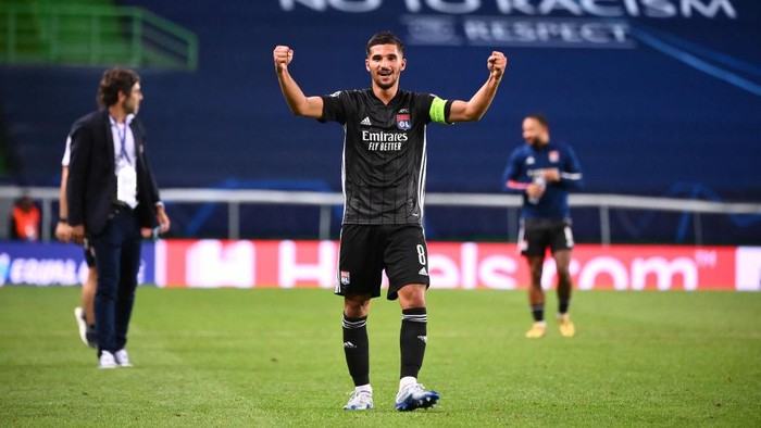 LISBON, PORTUGAL - AUGUST 15: Houssem Aouar of Olympique Lyon celebrates following his teams victory in the UEFA Champions League Quarter Final match between Manchester City and Lyon at Estadio Jose Alvalade on August 15, 2020 in Lisbon, Portugal. (Photo by Franck Fife/Pool via Getty Images)