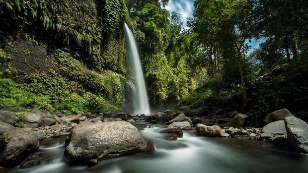 Sendang Gile waterfall is a stunning waterfall on Lombok, Indonesia. Long exposure photography.Sendang Gile waterfall is a stunning waterfall on Lombok, Indonesia. Long exposure photography.