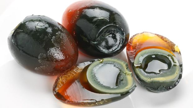 Century egg isolated on white background