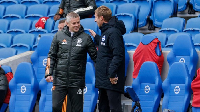BRIGHTON, ENGLAND - SEPTEMBER 26: Ole Gunnar Solskjaer, Manager of Manchester United greets Graham Potter, Head Coach of Brighton and Hove Albion prior to the Premier League match between Brighton & Hove Albion and Manchester United at American Express Community Stadium on September 26, 2020 in Brighton, England. Sporting stadiums around the UK remain under strict restrictions due to the Coronavirus Pandemic as Government social distancing laws prohibit fans inside venues resulting in games being played behind closed doors. (Photo by John Sibley - Pool/Getty Images)
