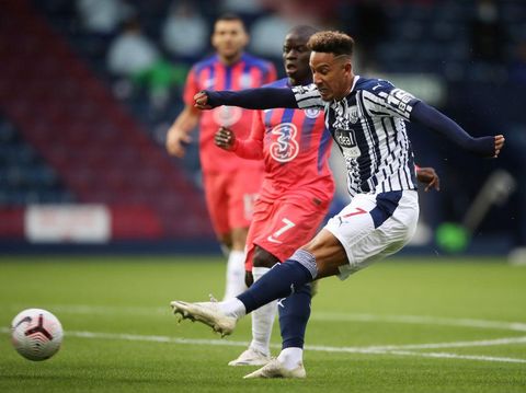 WEST BROMWICH, ENGLAND - SEPTEMBER 26: Callum Robinson of West Bromwich Albion scores his sides first goal during the Premier League match between West Bromwich Albion and Chelsea at The Hawthorns on September 26, 2020 in West Bromwich, England. Sporting stadiums around the UK remain under strict restrictions due to the Coronavirus Pandemic as Government social distancing laws prohibit fans inside venues resulting in games being played behind closed doors. (Photo by Nick Potts - Pool/Getty Images)
