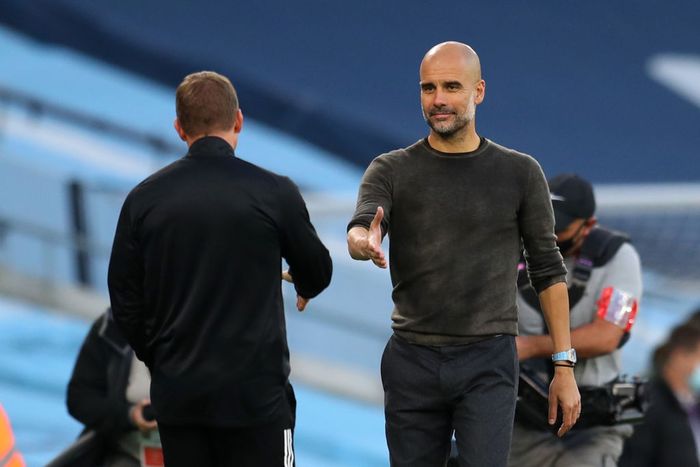 Brendan Rodgers, Pep Guardiola MANCHESTER, ENGLAND - SEPTEMBER 27: Pep Guardiola, Manager of Manchester City interacts with Brendan Rogers, Manager of Leicester City following the Premier League match between Manchester City and Leicester City at Etihad Stadium on September 27, 2020 in Manchester, England. Sporting stadiums around the UK remain under strict restrictions due to the Coronavirus Pandemic as Government social distancing laws prohibit fans inside venues resulting in games being played behind closed doors. (Photo by Catherine Ivill/Getty Images)