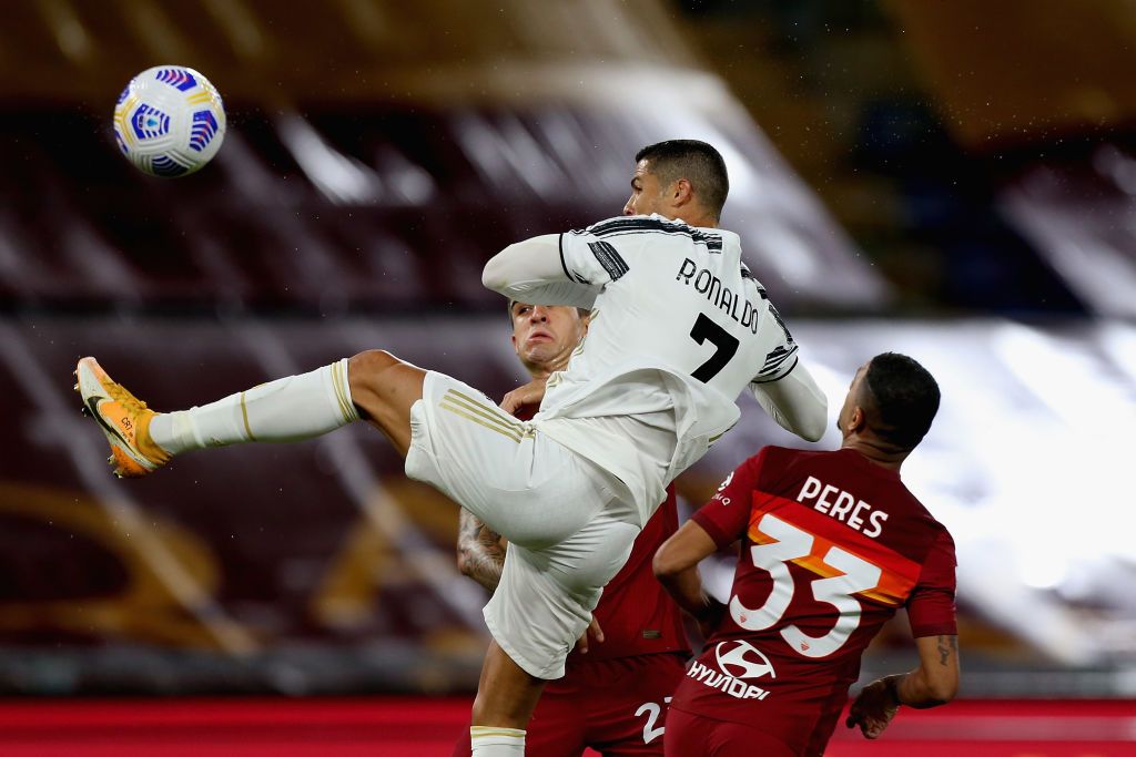 ROME, ITALY - SEPTEMBER 27: Cristiano Ronaldo of Juventus celebrates after scoring the team's second goal during the Serie A match between AS Roma and Juventus at Stadio Olimpico on September 27, 2020 in Rome, Italy.  (Photo by Paolo Bruno / Getty Images)