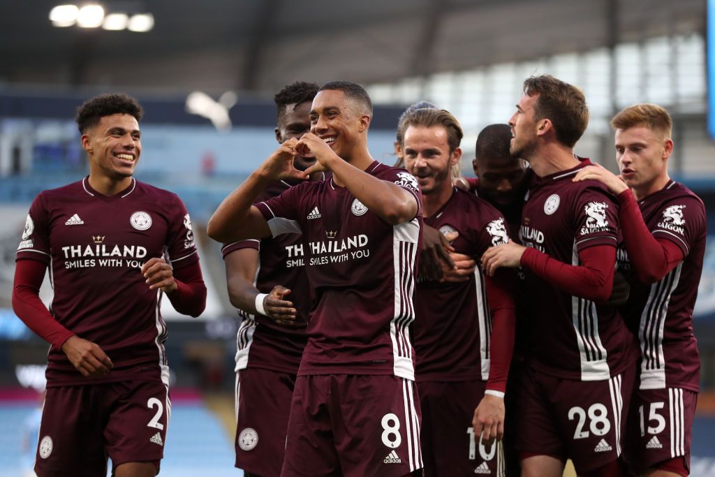 MANCHESTER, ENGLAND - SEPTEMBER 27: Youri Tielemans of Leicester City celebrates with teammates after scoring his sides fifth goal during the Premier League match between Manchester City and Leicester City at Etihad Stadium on September 27, 2020 in Manchester, England. Sporting stadiums around the UK remain under strict restrictions due to the Coronavirus Pandemic as Government social distancing laws prohibit fans inside venues resulting in games being played behind closed doors. (Photo by Catherine Ivill/Getty Images)