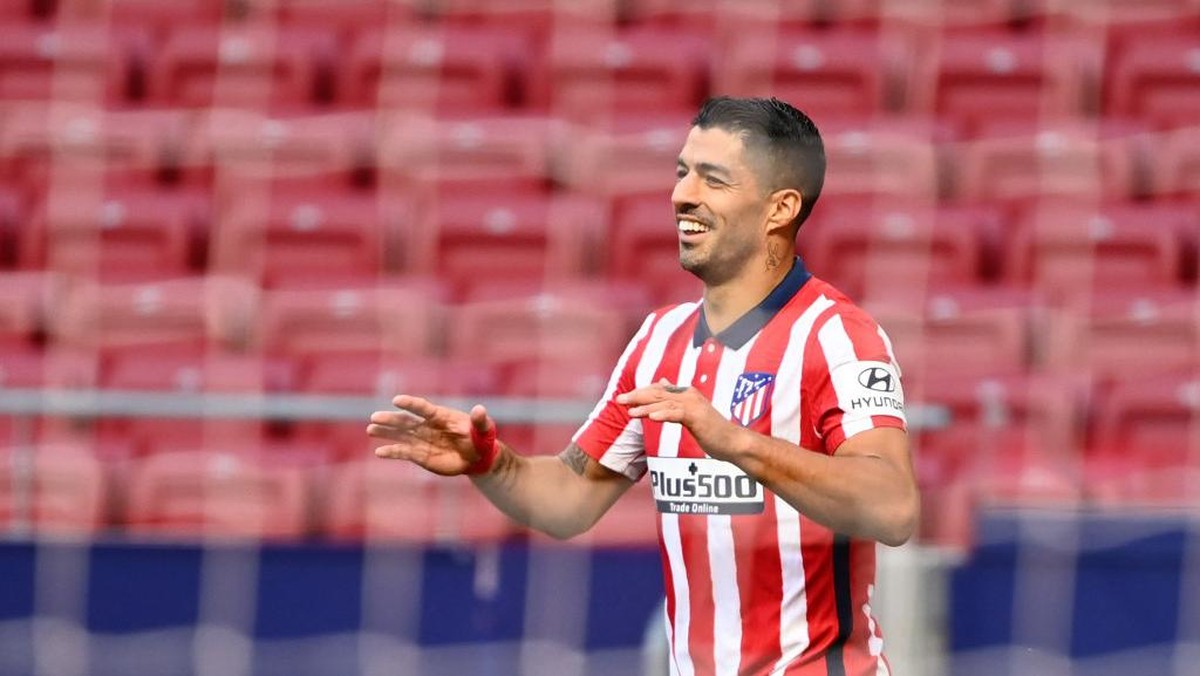 Pelatih Atletico Madrid Diego Simeone kagum dengan pergerakan Luis Suarez di laga debutnya. (Foto: AFP/GABRIEL BOUYS)