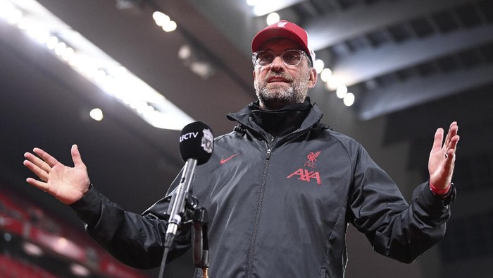 Liverpools manager Jurgen Klopp is interviewed after their English Premier League soccer match between Liverpool and Arsenal at Anfield in Liverpool, England, Monday, Sept. 28, 2020. (Laurence Griffiths/Pool via AP)
