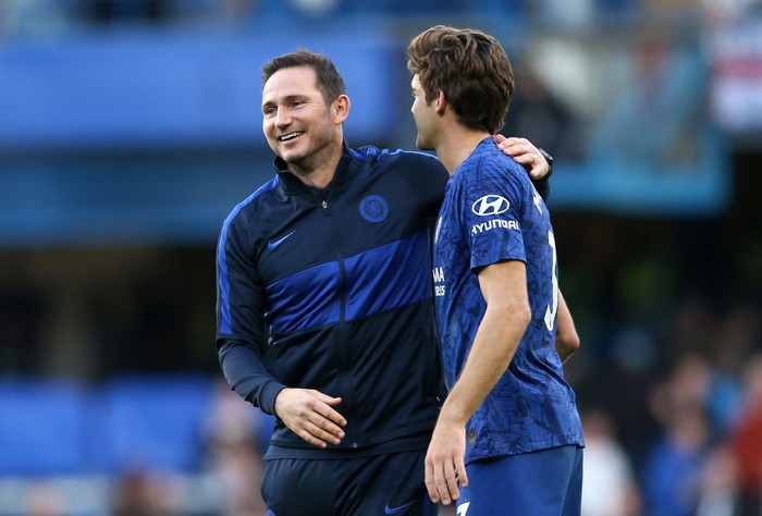 LONDON, ENGLAND - OCTOBER 19: Frank Lampard, Manager of Chelsea and Marcos Alonso of Chelsea celebrate victory following the Premier League match between Chelsea FC and Newcastle United at Stamford Bridge on October 19, 2019 in London, United Kingdom. (Photo by Paul Harding/Getty Images)