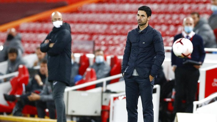 Arsenals manager Mikel Arteta watches play during the English Premier League soccer match between Liverpool and Arsenal at Anfield in Liverpool, England, Monday, Sept. 28, 2020. (Jason Cairnduff/Pool via AP)