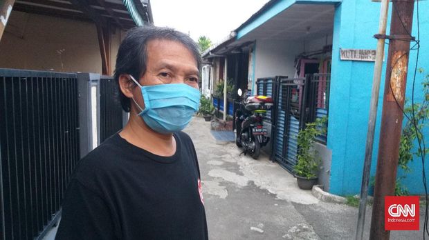 Budiantoro, Warga Kota Depok mengaku waswas harus tetap nyoblos di pilkada saat Depok berstatus zona merah Covid-19.
