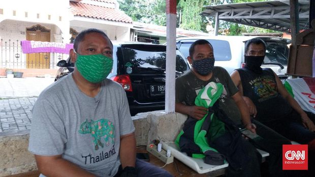 Cepy, Warga Kota Depok mengaku waswas harus tetap nyoblos di pilkada saat Depok berstatus zona merah Covid-19.