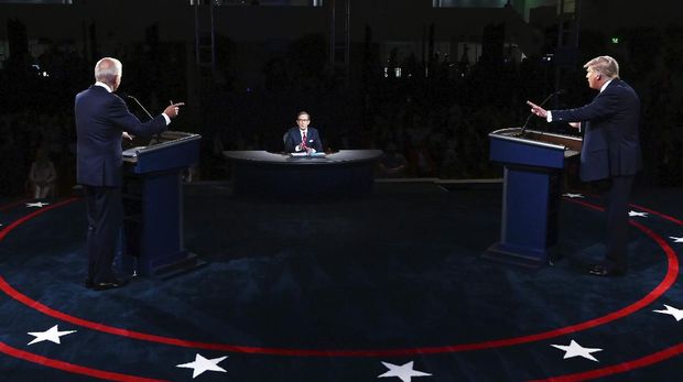 President Donald Trump and Democratic presidential candidate former Vice President Joe Biden participate in the first presidential debate Tuesday, Sept. 29, 2020, at Case Western University and Cleveland Clinic, in Cleveland. (Olivier Douliery/Pool vi AP)
