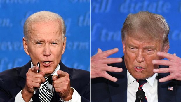 (COMBO) This combination of pictures created on September 29, 2020 shows Democratic Presidential candidate and former US Vice President Joe Biden (L) and US President Donald Trump speaking during the first presidential debate at the Case Western Reserve University and Cleveland Clinic in Cleveland, Ohio on September 29, 2020. (Photos by Jim WATSON and SAUL LOEB / AFP)