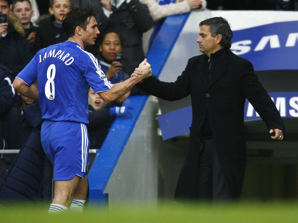 LONDON - MARCH 8:  Frank Lampard and Jose Mourinho of Chelsea celebrate victory at the end of the UEFA Champions League, First Knockout Round, Second Leg match between Chelsea and Barcelona at Stamford Bridge on March 8, 2005 in London, England.  (Photo by Shaun Botterill/Getty Images)