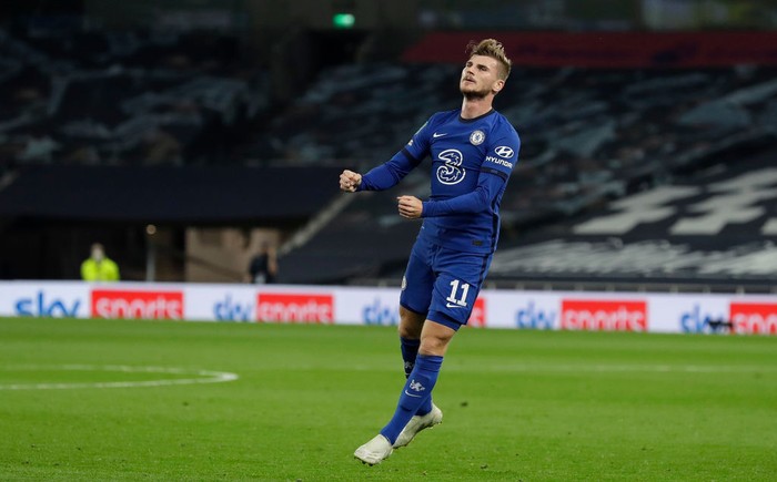 LONDON, ENGLAND - SEPTEMBER 29: Timo Werner of Chelsea celebrates after scoring his teams first goal during the Carabao Cup fourth round match between Tottenham Hotspur and Chelsea at Tottenham Hotspur Stadium on September 29, 2020 in London, England. Football Stadiums around United Kingdom remain empty due to the Coronavirus Pandemic as Government social distancing laws prohibit fans inside venues resulting in fixtures being played behind closed doors. (Photo by Matt Dunham - Pool/Getty Images)