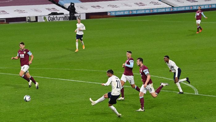 Burnley, Manchester City BURNLEY, ENGLAND - SEPTEMBER 30: Ferran Torres of Manchester City scores his sides third goal during the Carabao Cup fourth round match between Burnley and Manchester City at Turf Moor on September 30, 2020 in Burnley, England. Football Stadiums around United Kingdom remain empty due to the Coronavirus Pandemic as Government social distancing laws prohibit fans inside venues resulting in fixtures being played behind closed doors. (Photo by Paul Ellis - Pool/Getty Images)