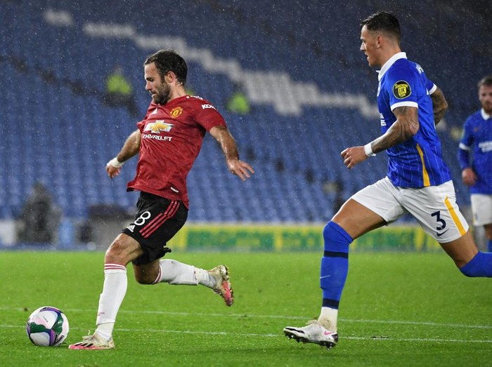 BRIGHTON, ENGLAND - SEPTEMBER 30: Juan Mata of Manchester United scores his sides second goal during the Carabao Cup fourth round match between Brighton and Hove Albion and Manchester United at Amex Stadium on September 30, 2020 in Brighton, England. Football Stadiums around United Kingdom remain empty due to the Coronavirus Pandemic as Government social distancing laws prohibit fans inside venues resulting in fixtures being played behind closed doors. (Photo by Andy Rain - Pool/Getty Images)