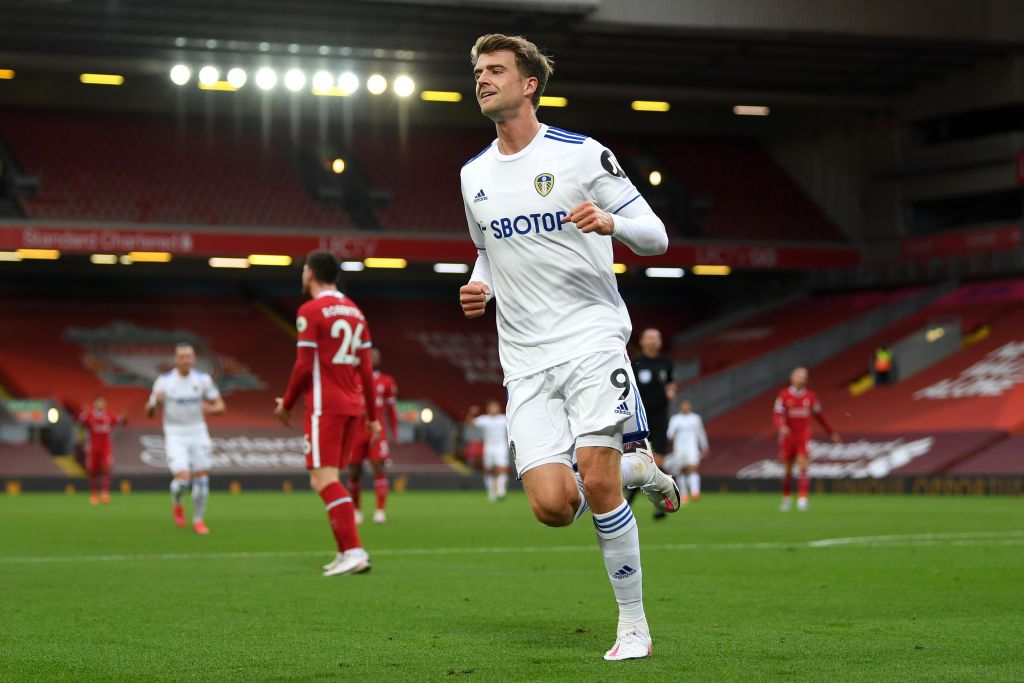 LIVERPOOL, ENGLAND - SEPTEMBER 12: Patrick Bamford of Leeds United celebrates after scoring his team's second goal during the Premier League match between Liverpool and Leeds United at Anfield on September 12, 2020 in Liverpool, England. (Photo by Shaun Botterill/Getty Images)