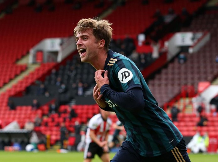 LIVERPOOL, ENGLAND - SEPTEMBER 12: Patrick Bamford of Leeds United celebrates after scoring his team's second goal during the Premier League match between Liverpool and Leeds United at Anfield on September 12, 2020 in Liverpool, England. (Photo by Shaun Botterill/Getty Images)