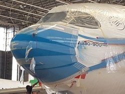 Melihat Penampakan Pesawat Garuda Indonesia Kenakan Masker