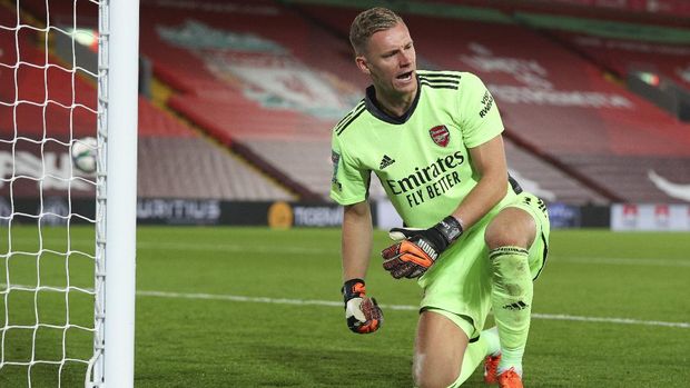 Arsenal's goalkeeper Bernd Leno reacts after saving a penalty during the English League Cup fourth round soccer match between Liverpool and Arsenal at Anfield, Liverpool, England, Thursday, Oct. 1, 2020. (Peter Byrne/Pool via AP)